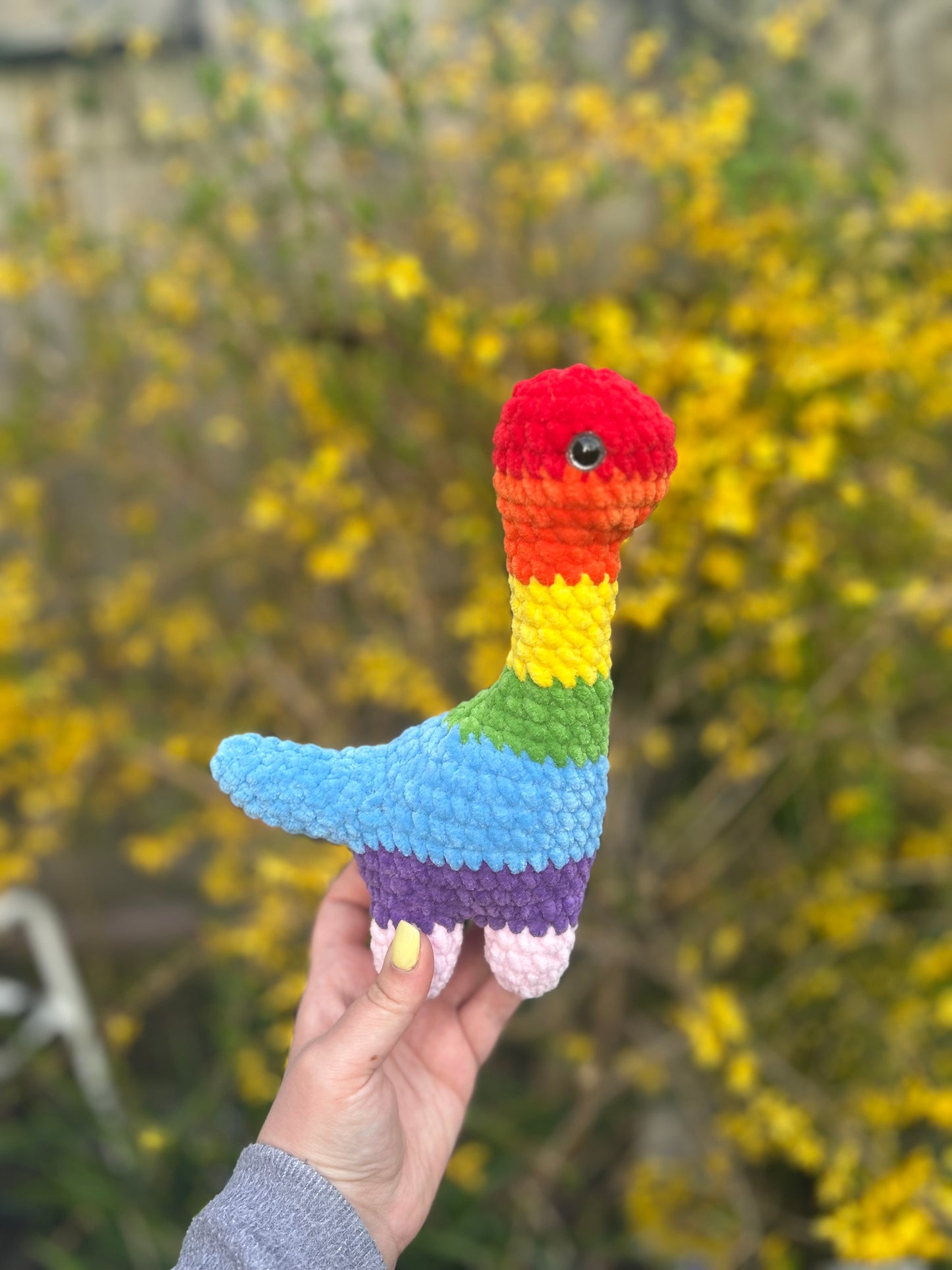 Rainbow Crochet Brontosaurus Toy