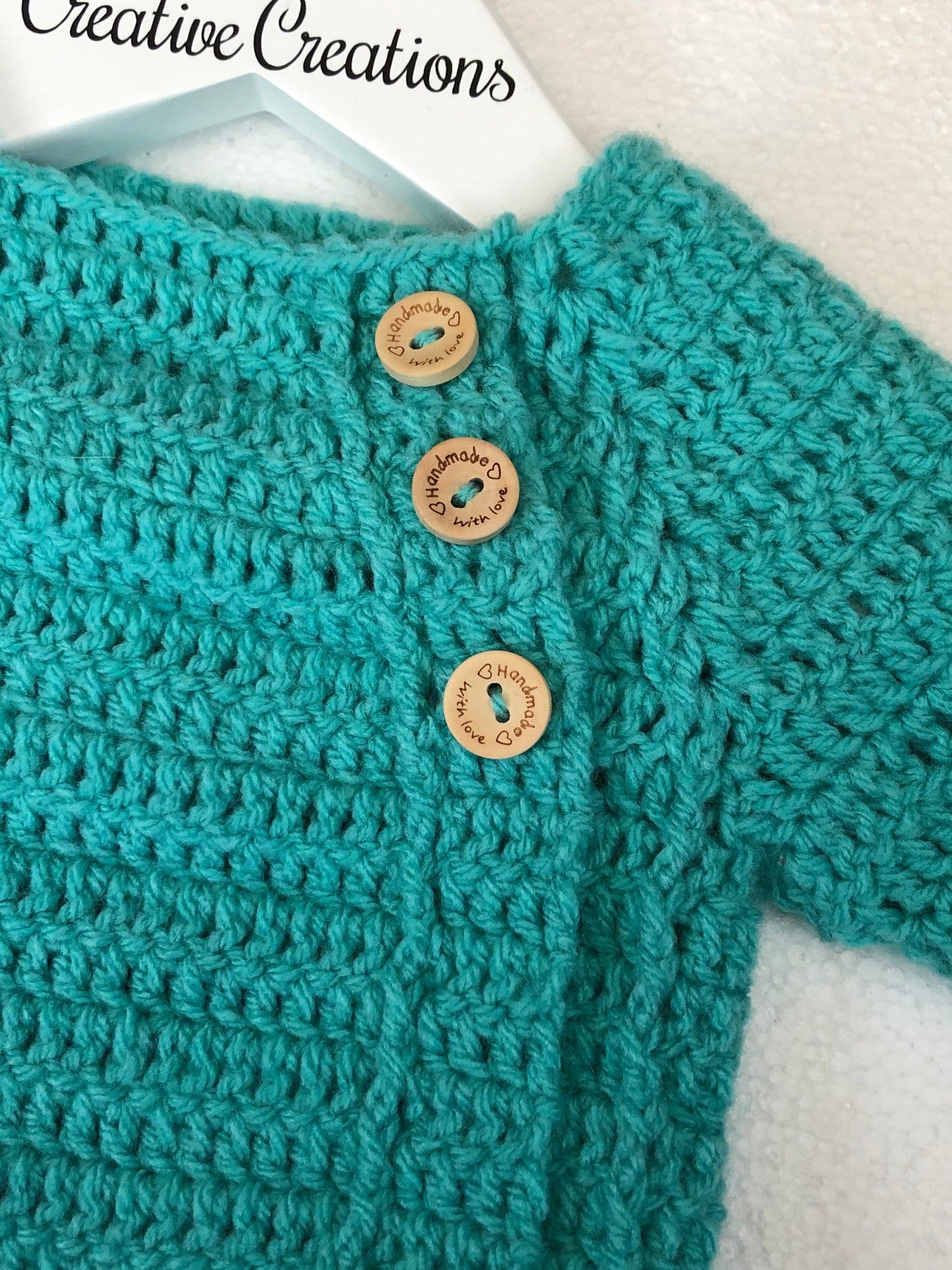 Small Newborn Crocheted Teal Baby Jumper